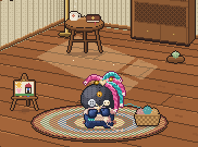 Endie on the rug in her nook, knitting, beside her basket of yarn